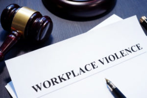 workplace violence on paper with gavel