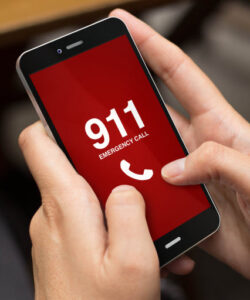 someone on phone calling 911 emergency