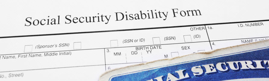 social security disability form and part of a social security card
